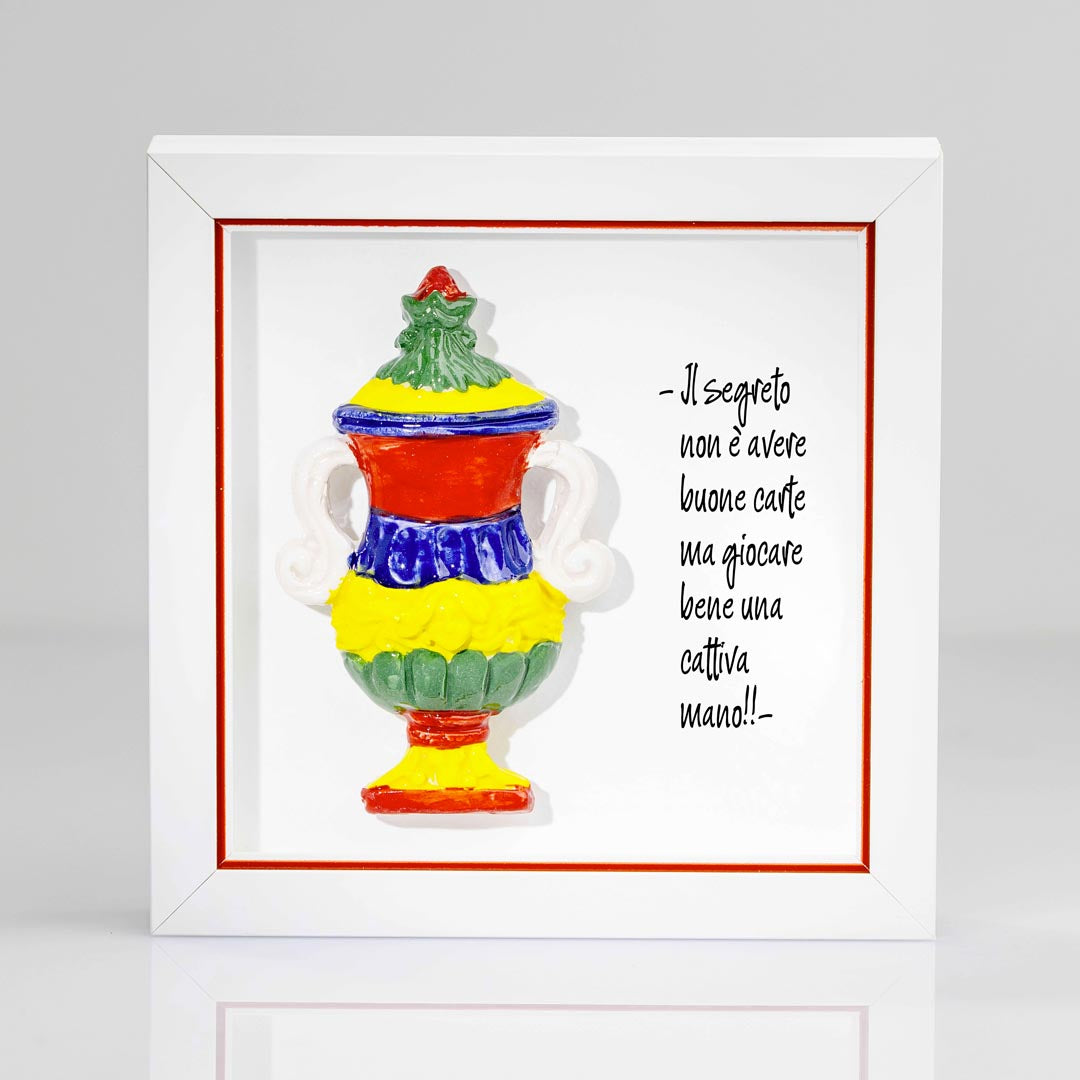 Quadro artigianale con Asso di Coppe delle carte napoletane in ceramica colorata e cornice bianca e rigo rosso