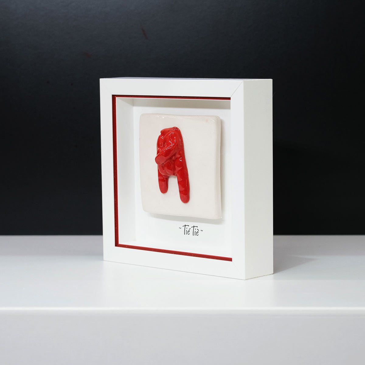 Ceramic Tile with Red Horns
