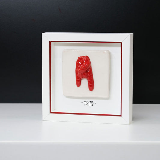 Ceramic Tile with Red Horns